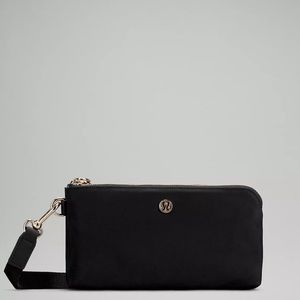 Black authentic Lululemon curved wristlet